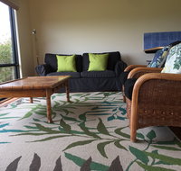 Black Cockatoo Cottages - Accommodation Whitsundays