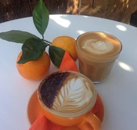 The Orange Tree - licensed cafe by the river - Accommodation Whitsundays