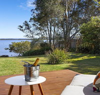 Braeside - waterfront fireplace - Accommodation Whitsundays