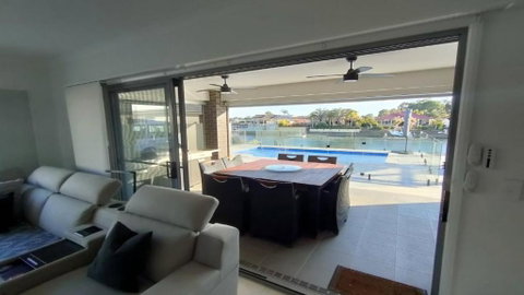 Relax Poolside By The Canal - Accommodation Whitsundays 0