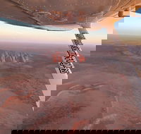 Scenic Flight Uluru Rock Blast - Accommodation Whitsundays